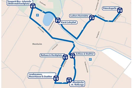 Karte mit einer Rundroute durch Monheim mit acht Lauschtour-Punkten und deren Bezeichnungen sowie Straßenverlauf.