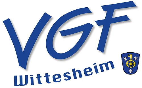 Logo mit blauen Großbuchstaben „VGF“ und darunter „Wittesheim“ rechts ein blaues Wappen mit gelbem Schlüssel und drei weißen Sternen auf weißem Hintergrund.
